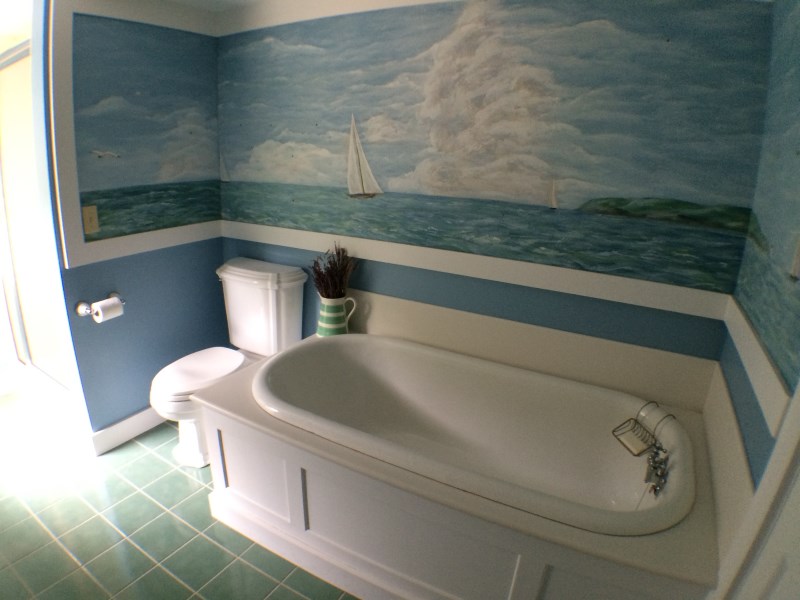 Bathtub with painting from original house